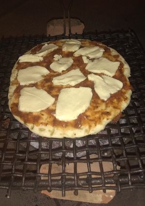 Una foto de Pizzas a la parrilla