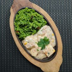 A picture of Creamy Paneer with Spinach Rice.