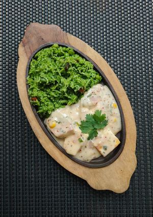 A picture of Creamy Paneer with Spinach Rice.