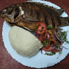 A picture of Fried fish with kachumbari.