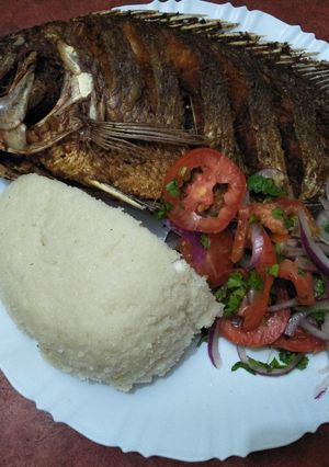 A picture of Fried fish with kachumbari.