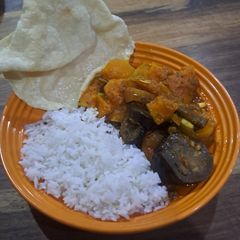 A picture of Oven-roasted Aubergine and Butternut Curry.