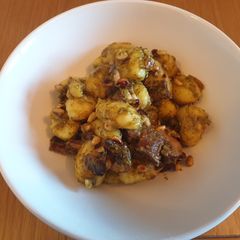 A picture of Gnochi with Mushrooms and Pine Nuts.