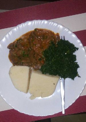 A picture of Liver, greens and ugali.