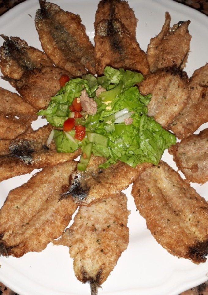 Una foto de Bocartes rebozados al vino blanco