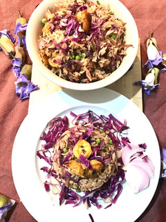 A picture of Purple cabbage and shrimp fried rice.