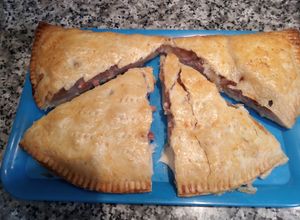 Foto principal de Empanadas de Pechuga de pollo con bacon, dátiles y queso con masa Quebrada
