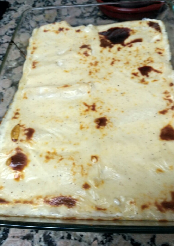 Una foto de Canelones de rape y gambas