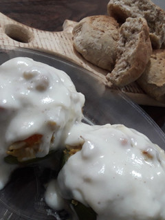 Una foto de Zapallitos rellenos con salsa blanca