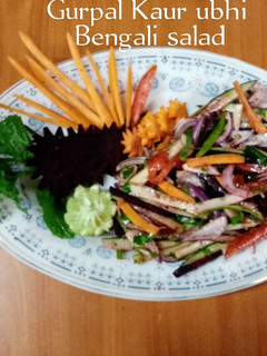 A picture of Bengali salad 🥗🧅🥕🍅🌶️🥒.
