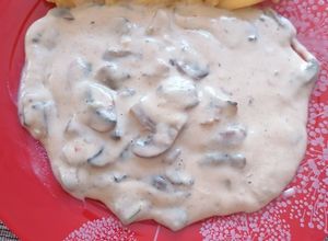 O poză a rețetei Tocăniță ardelenească de ciuperci cu lapte și smântână.