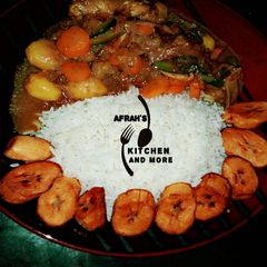 Vegetables chicken soup,white rice and fried plantain A picture of Vegetables chicken soup,white rice and fried plantain.