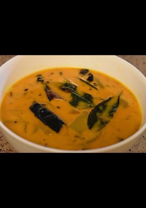 A picture of Raw mango curry in Coconut milk.