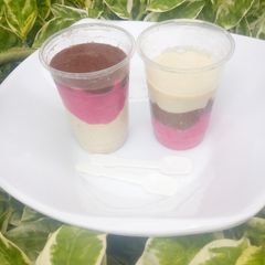 A picture of Banana chocolate and strawberry smoothie.
