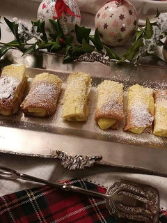 Foto di Cannoli di pandoro con crema al mandarino