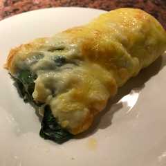 Una foto de Rollitos de queso y espinaca