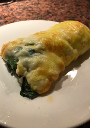 Una foto de Rollitos de queso y espinaca