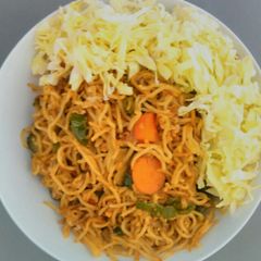 A picture of Coconut flavored noodles with cabbage.