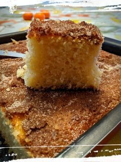 Una foto de Coca de llanda con naranja y miel