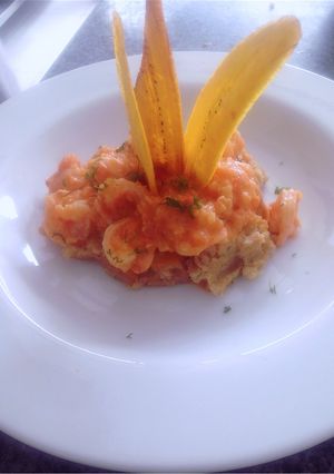 Una foto de Cayeye con camarones en leche de coco