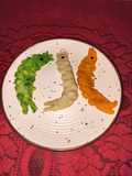 Tri color shrimp shape pitha