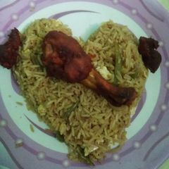 A picture of Fried rice with chicken fried.