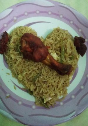 A picture of Fried rice with chicken fried.