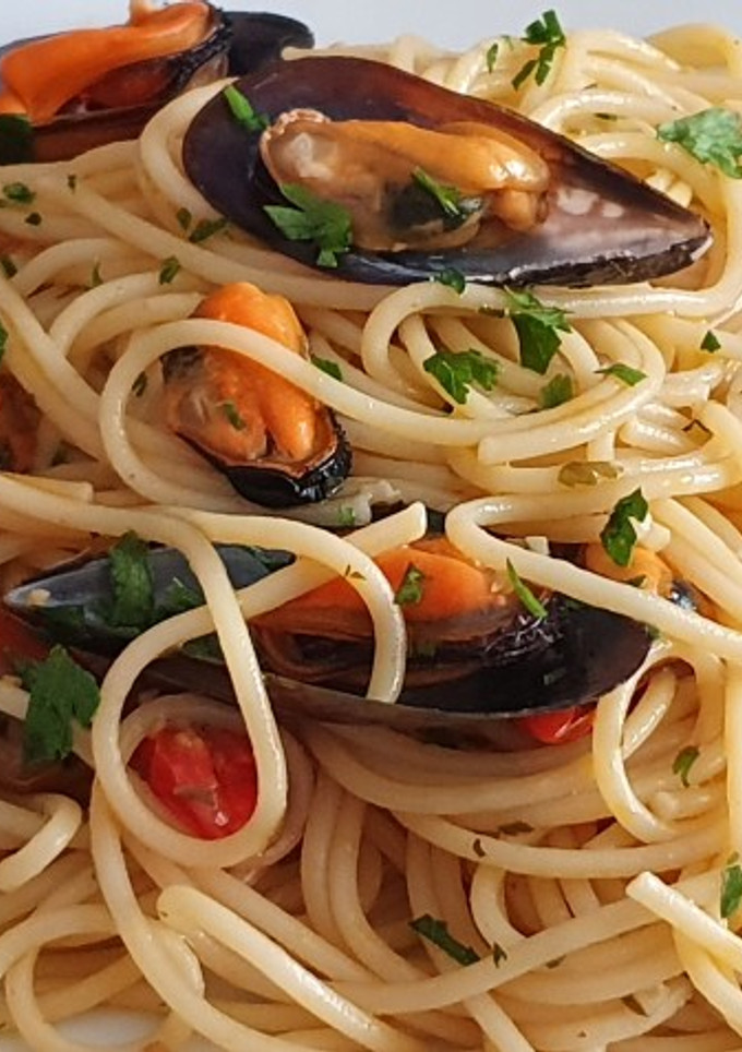 Una foto de Spaghetti con le cozze e pomodorini