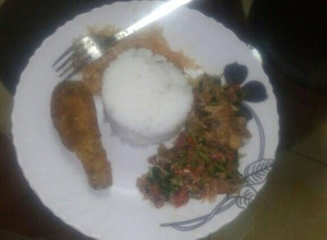 A picture of Braised rice acco by chicken stakes,ratatoulle,cabbage.