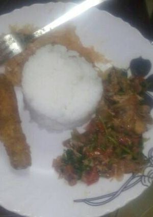 A picture of Braised rice acco by chicken stakes,ratatoulle,cabbage.
