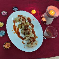A picture of Steam Chicken staff cabbage rolls with sauce / yammy tasty recip.