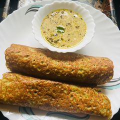 A picture of Sprouted Dosa with Green Chutney Full meal,with Rich Protins and vegetable.