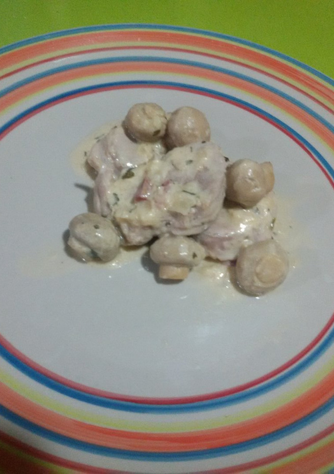 Una foto de Solomillo de cerdo con salsa de champiñones