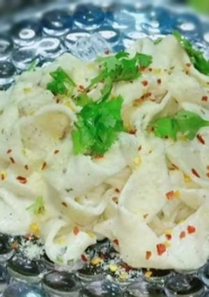 A picture of Alfredo fettuccine pasta.