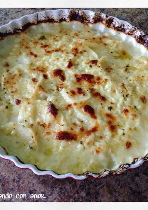 Una foto de Papas al horno en salsa blanca