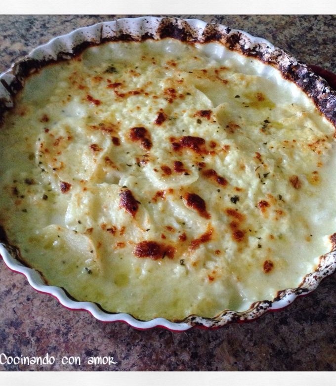 Una foto de Papas al horno en salsa blanca