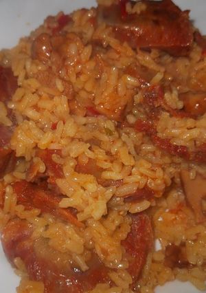 Una foto de Arroz con costillas adobadas secas y niscalos de mayo