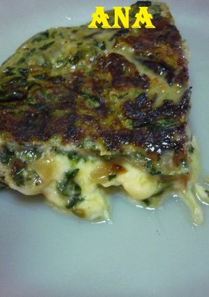 Una foto de Tortilla de acelga rellena con queso
