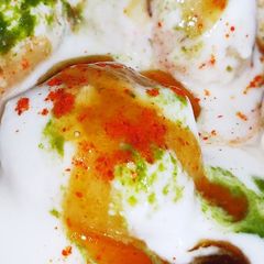 A picture of Moong dal dahi vada.