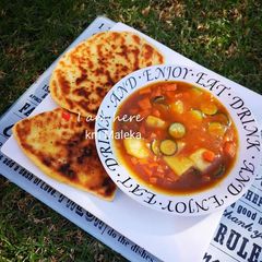 Vegetable soup with Naan bread A picture of Vegetable soup with Naan bread.