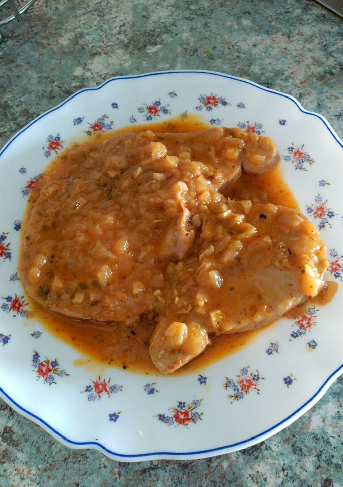 Una foto de Atún encebollado