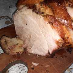 Una foto de Pernil de cerdo al horno festivo
