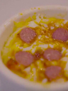 A picture of Pizza in a mug.