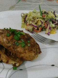 A picture of Grilled Chicken with Green Salad.