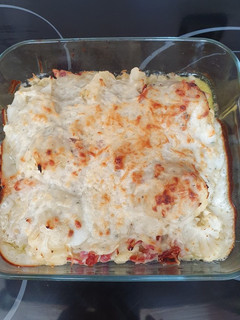 Una foto de Coliflor con bechamel, bacon y queso azul