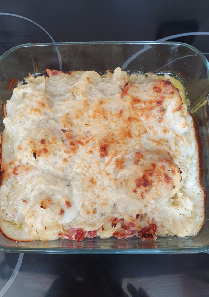 Una foto de Coliflor con bechamel, bacon y queso azul