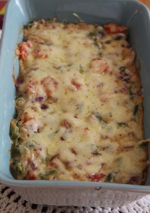 A picture of Cheesy baked vegetable and rice.