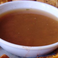 A picture of Tamarind chutney (sweet and sour sauce).