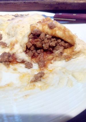 Una foto de Filloas con buey y queso de cabra