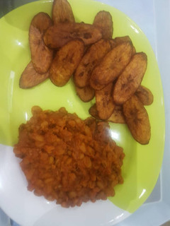 A picture of Beans and fried plantain.